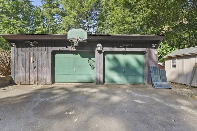 135 Pine St, Rochester, MA 02770 - garage featuring asphalt driveway