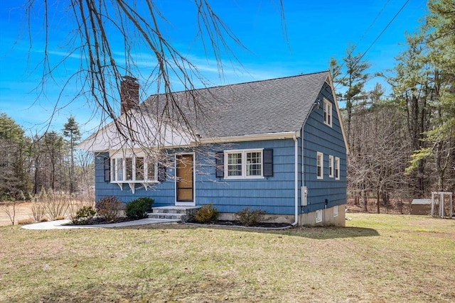 331 Townsend Rd, Groton, MA 01450 - view of front of house featuring a chimney, roof with shingles, and a front lawn