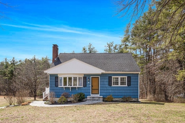 331 Townsend Rd, Groton, MA 01450 - bungalow-style home featuring a chimney, a front lawn, and a shingled roof