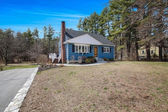 331 Townsend Rd, Groton, MA 01450 - view of front of property featuring a chimney and a front yard