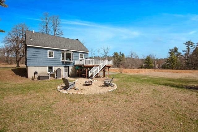 331 Townsend Rd, Groton, MA 01450 - back of house featuring stairs, a deck, a fire pit, a lawn, and roof with shingles