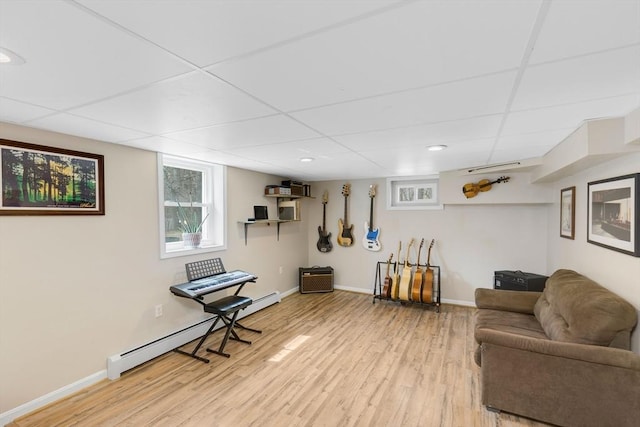 331 Townsend Rd, Groton, MA 01450 - living area with baseboard heating, light wood-style flooring, a drop ceiling, and recessed lighting