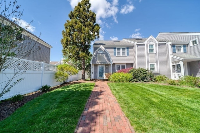 view of front of home with a front yard