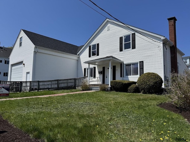 61 Belleville Rd, New Bedford, MA 02745 - traditional-style house featuring a chimney, a porch, a front yard, and a garage