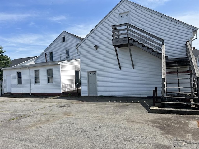 61 Belleville Rd, New Bedford, MA 02745 - back of house with stairs