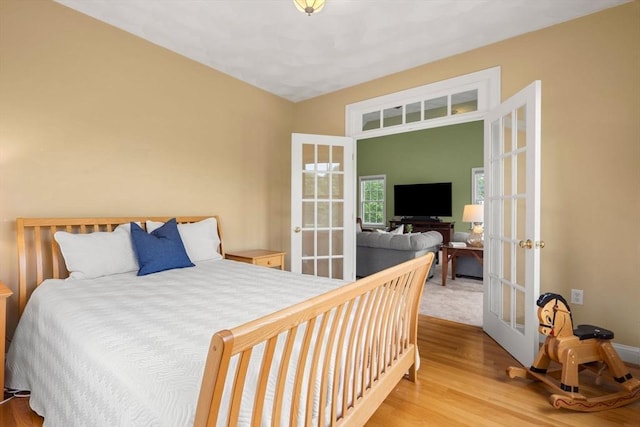 160 Wharton Row, Groton, MA 01450 - bedroom with french doors and wood finished floors