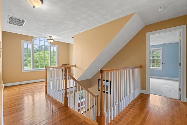160 Wharton Row, Groton, MA 01450 - hall with an upstairs landing and wood finished floors