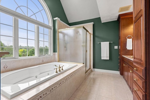 160 Wharton Row, Groton, MA 01450 - bathroom featuring a stall shower, a whirlpool tub, vaulted ceiling, tile patterned floors, and vanity