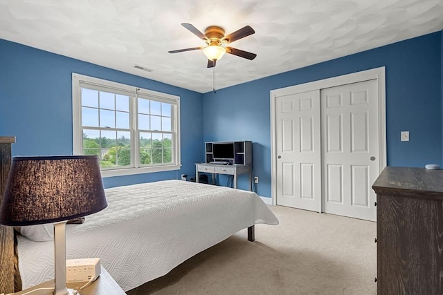 160 Wharton Row, Groton, MA 01450 - carpeted bedroom featuring a closet and ceiling fan