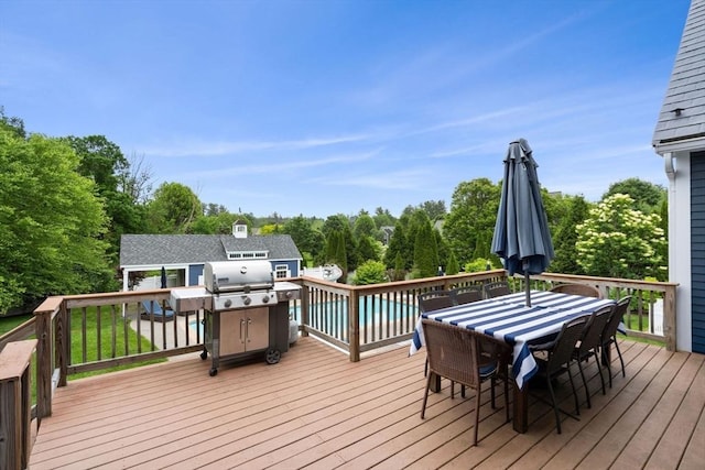 160 Wharton Row, Groton, MA 01450 - wooden terrace featuring outdoor dining area, an outdoor structure, area for grilling, and view of wooded area