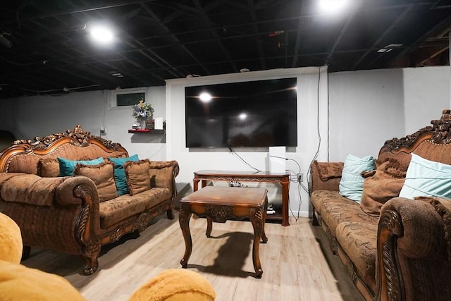 home theater featuring light wood-type flooring