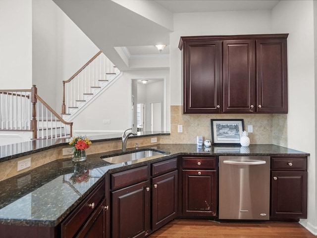72 Sherwood Dr Unit 72, Methuen, MA 01844 - kitchen featuring stainless steel dishwasher, wood finished floors, dark stone counters, crown molding, and tasteful backsplash