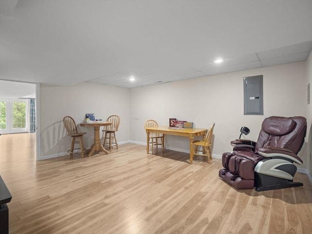 72 Sherwood Dr Unit 72, Methuen, MA 01844 - living area featuring electric panel and light wood finished floors