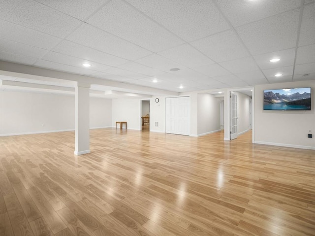 72 Sherwood Dr Unit 72, Methuen, MA 01844 - finished basement with light wood-style flooring, a drop ceiling, and recessed lighting