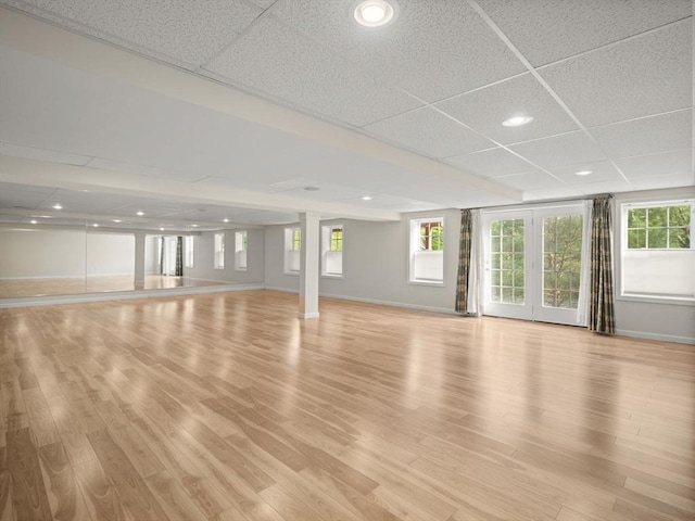 72 Sherwood Dr Unit 72, Methuen, MA 01844 - unfurnished living room featuring light wood-type flooring, recessed lighting, and a drop ceiling