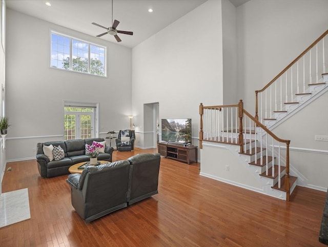 72 Sherwood Dr Unit 72, Methuen, MA 01844 - living area featuring a high ceiling, ceiling fan, wood finished floors, stairway, and recessed lighting