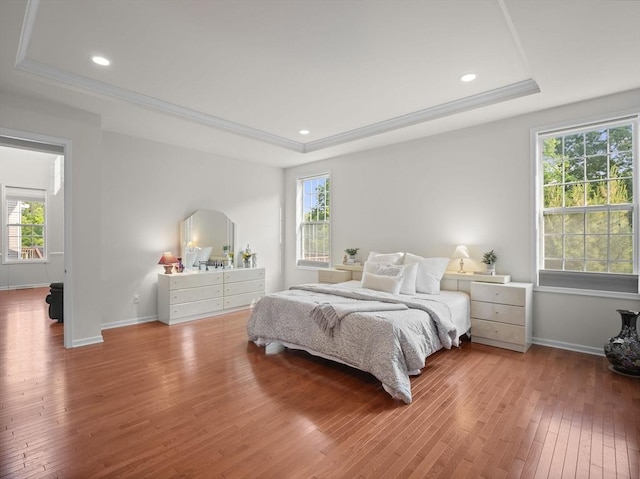 72 Sherwood Dr Unit 72, Methuen, MA 01844 - bedroom with a tray ceiling, wood-type flooring, multiple windows, recessed lighting, and ornamental molding
