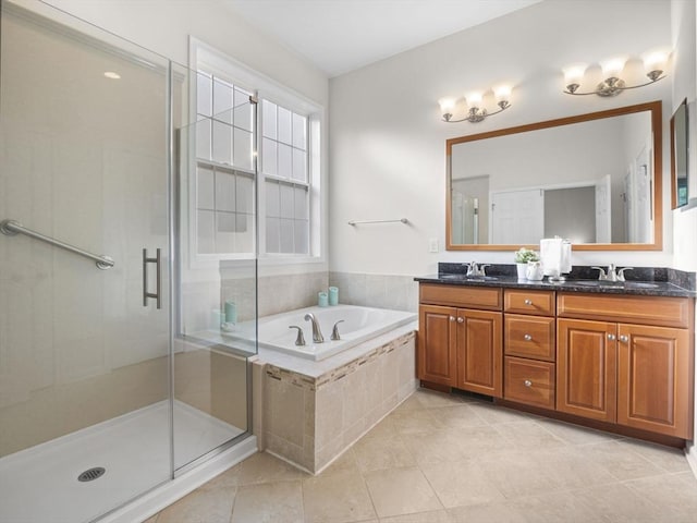 72 Sherwood Dr Unit 72, Methuen, MA 01844 - bathroom with double vanity, a bath, a shower stall, and tile patterned floors