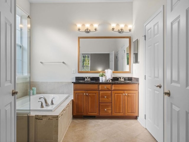 72 Sherwood Dr Unit 72, Methuen, MA 01844 - bathroom featuring double vanity, a bath, and tile patterned flooring
