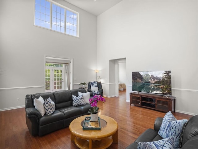 72 Sherwood Dr Unit 72, Methuen, MA 01844 - living room with a towering ceiling and wood finished floors