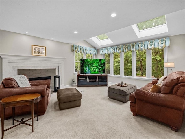 1 Benjamin Dr, Westborough, MA 01581 - living area with a skylight, carpet, a brick fireplace, recessed lighting, and baseboards