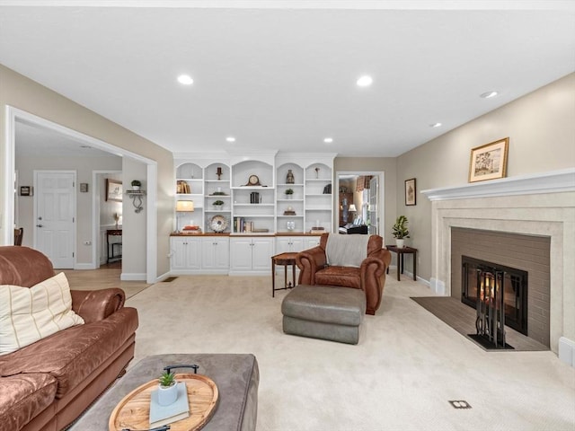 1 Benjamin Dr, Westborough, MA 01581 - living room with a fireplace with flush hearth, recessed lighting, light carpet, and baseboards