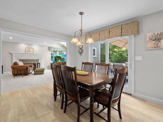 1 Benjamin Dr, Westborough, MA 01581 - dining area with healthy amount of natural light, a chandelier, baseboards, light wood-style flooring, and recessed lighting