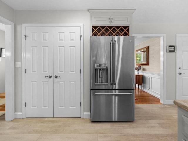 1 Benjamin Dr, Westborough, MA 01581 - kitchen with stainless steel fridge and light wood-type flooring