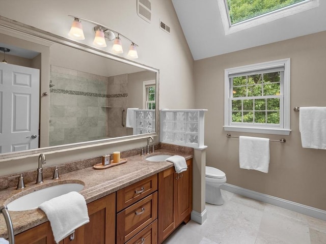 1 Benjamin Dr, Westborough, MA 01581 - full bathroom with double vanity, a skylight, toilet, baseboards, and tiled shower