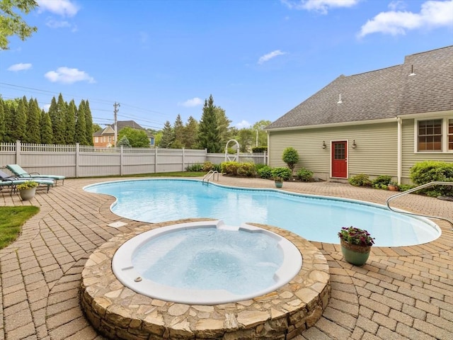 1 Benjamin Dr, Westborough, MA 01581 - view of pool featuring a patio, a fenced backyard, and a pool with connected hot tub