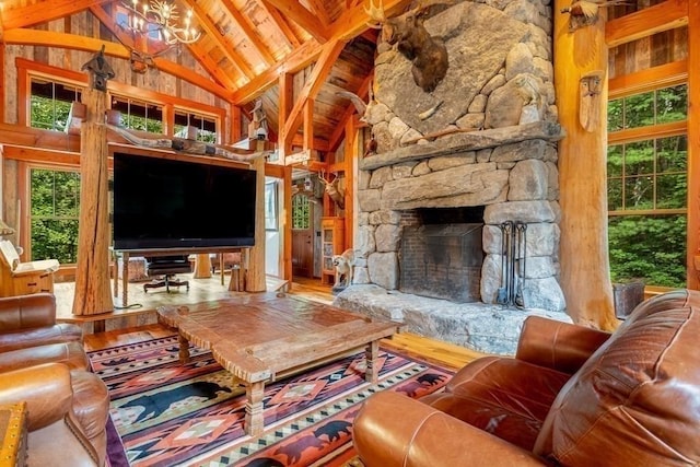 living room featuring an inviting chandelier, high vaulted ceiling, wooden ceiling, beamed ceiling, and a fireplace