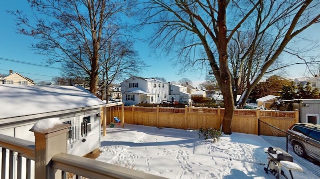 view of yard covered in snow