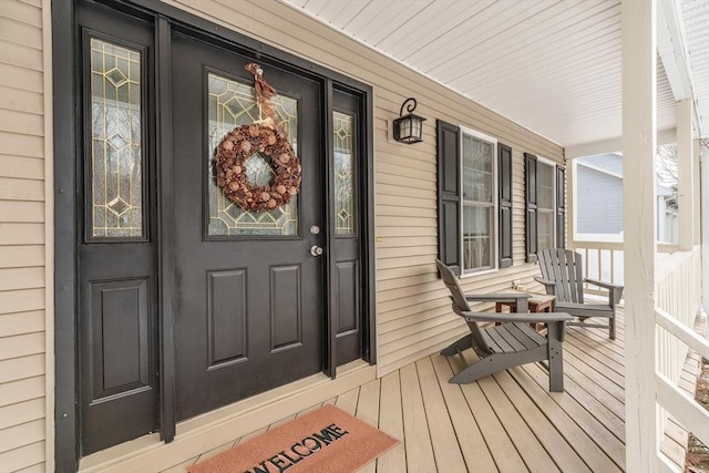 entrance to property with a porch