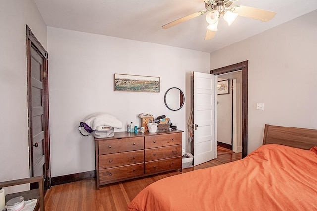 49-51 Fairmount Ave, Somerville, MA 02144 - bedroom with wood finished floors, baseboards, and ceiling fan