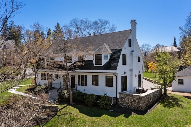 exterior space with a garage and a front lawn