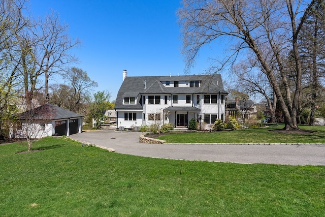 view of front facade with a front lawn