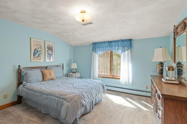 bedroom with visible vents, lofted ceiling, carpet floors, a textured ceiling, and a baseboard radiator