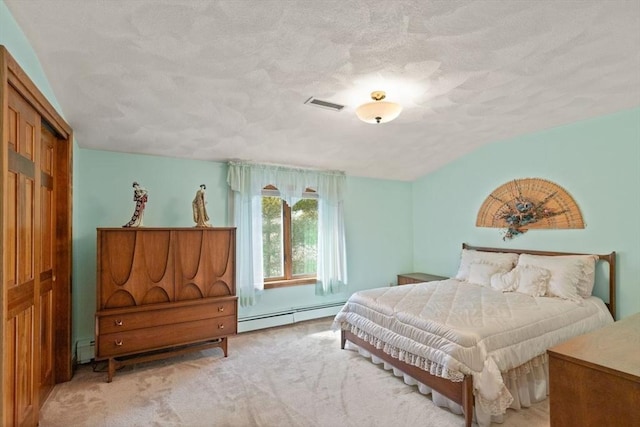 carpeted bedroom featuring vaulted ceiling, visible vents, a textured ceiling, and a baseboard radiator