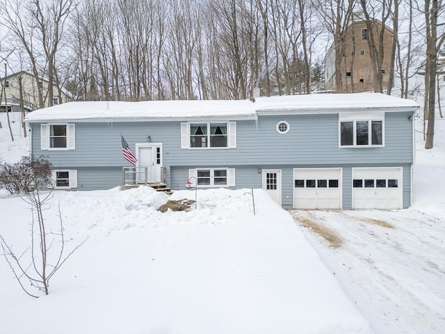 bi-level home featuring a garage