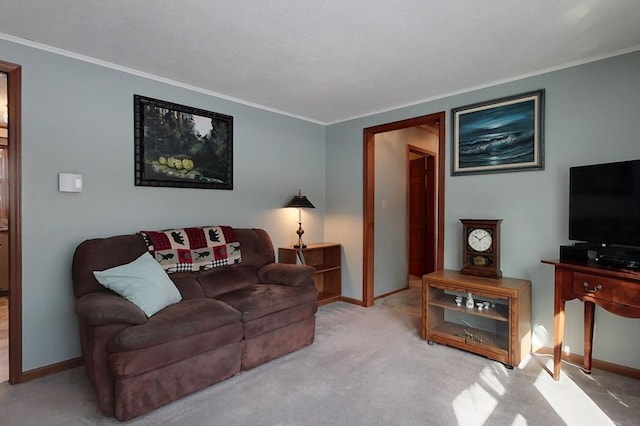 living room featuring ornamental molding, carpet floors, and baseboards