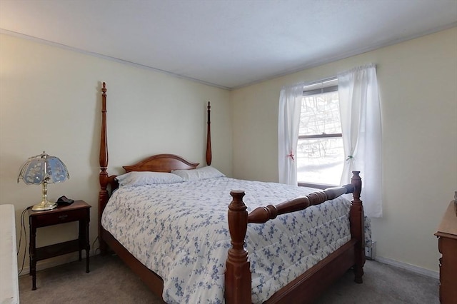 carpeted bedroom with baseboards