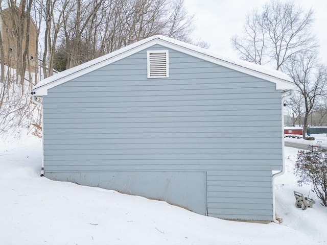 view of snow covered property