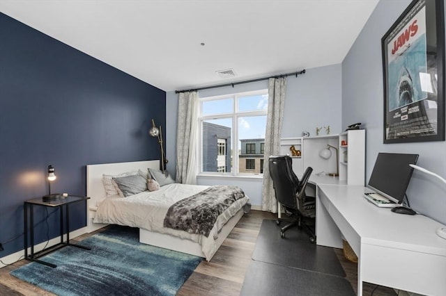 180 Telford St Unit 614, Boston, MA 02135 - bedroom with wood finished floors and an office area