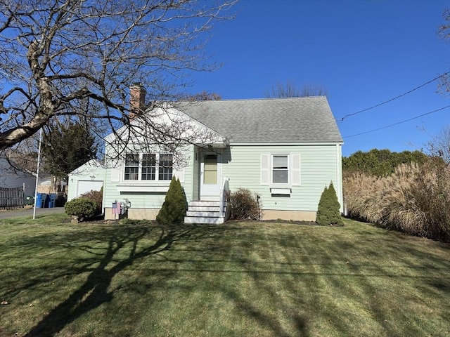 view of front of property with a front lawn