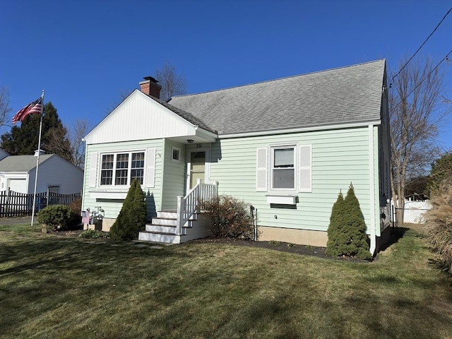 view of front of house with a front lawn