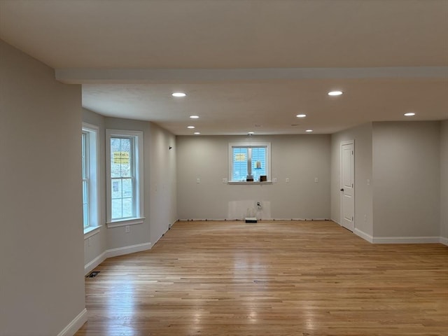 spare room with light wood-type flooring