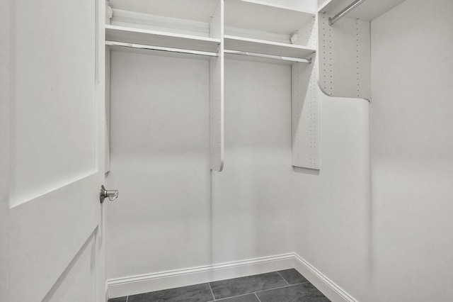 140 Main St Unit E, Amesbury, MA 01913 - spacious closet with dark tile patterned flooring