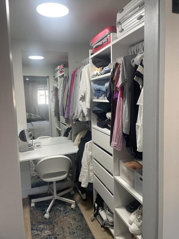 200 Manning St Unit 17C, Hudson, MA 01749 - walk in closet with wood finished floors