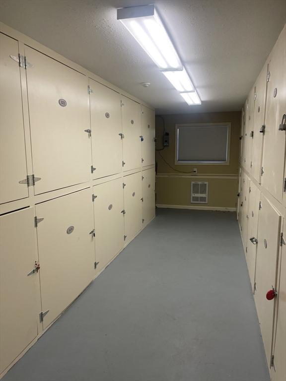 200 Manning St Unit 17C, Hudson, MA 01749 - hall featuring concrete floors