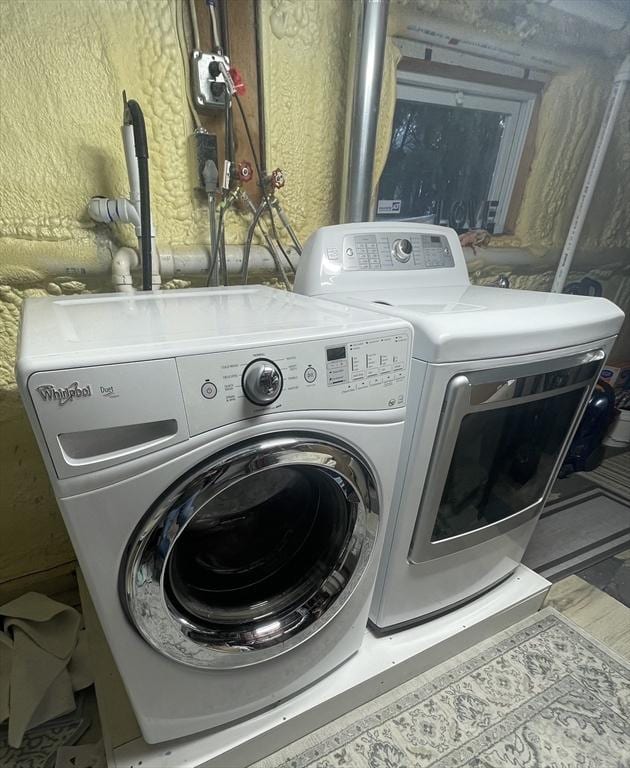 15 Bates Rd, Framingham, MA 01702 - clothes washing area with separate washer and dryer, laundry area, and a textured wall